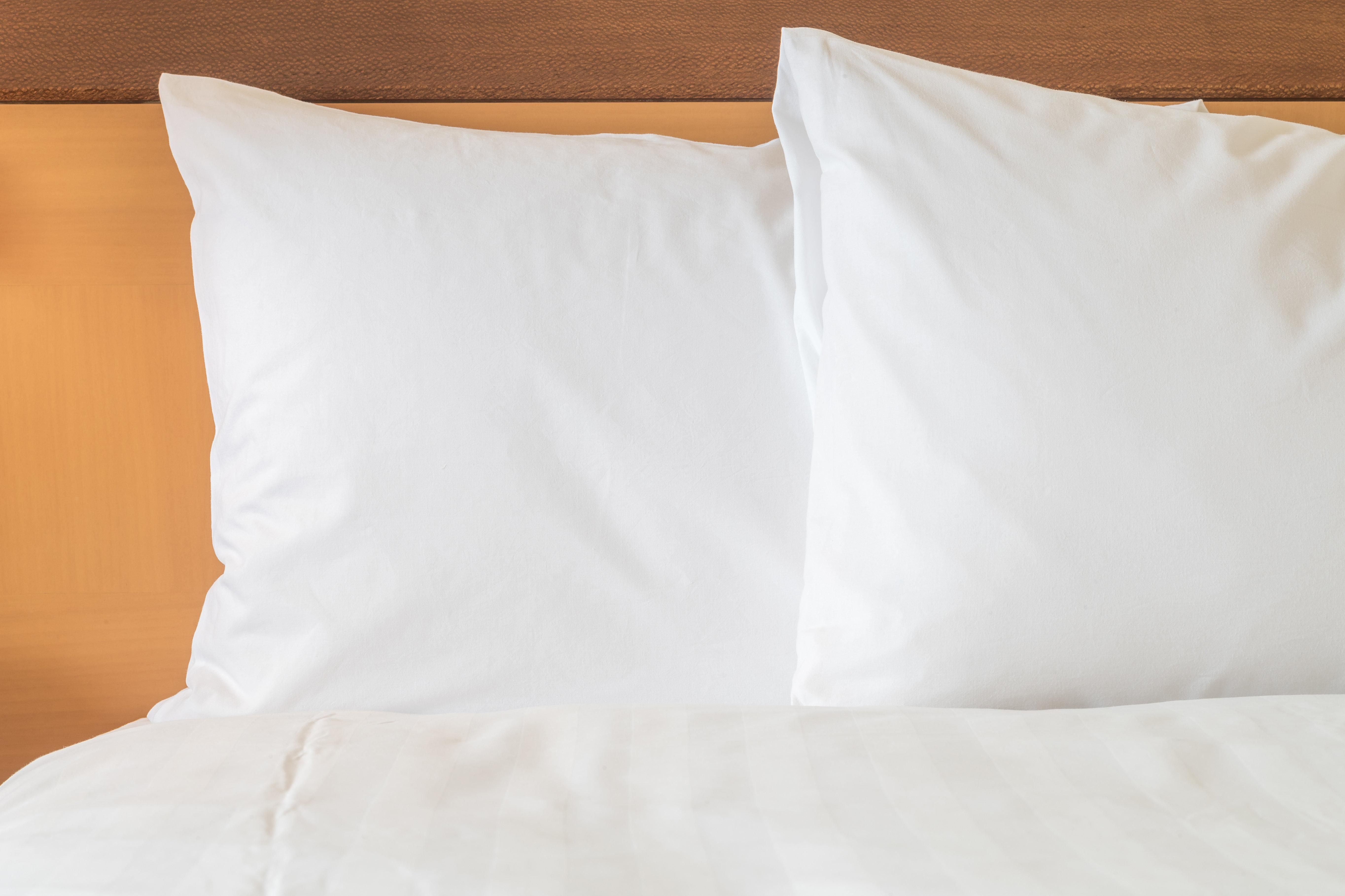 Hotel Intercontinental Cali By Ihg Exterior foto Two pillows on a bed
